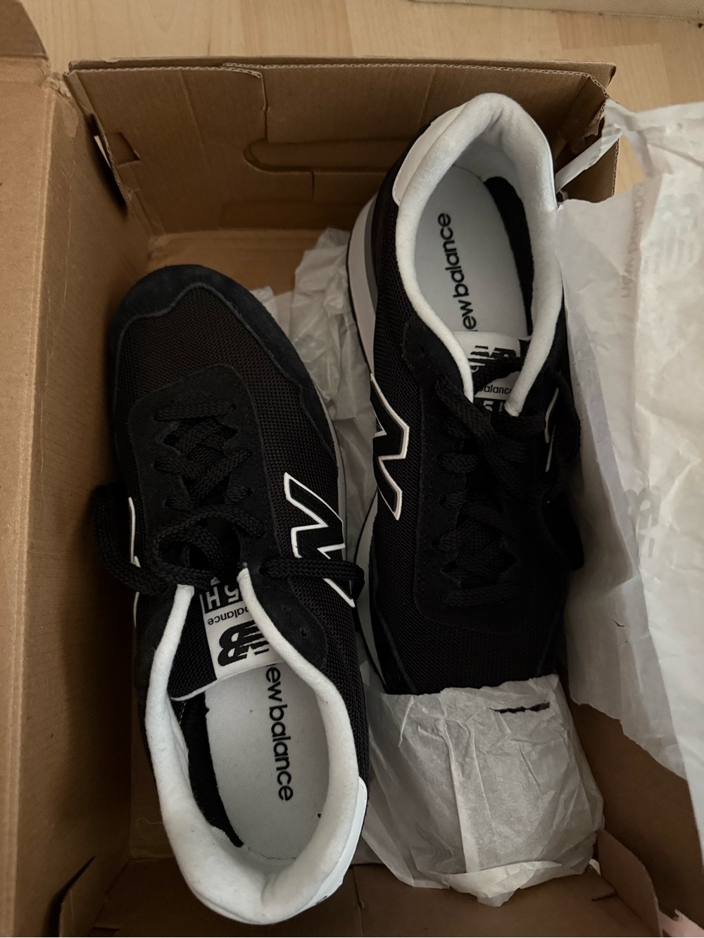 New Balance Men’s Black and White Low-Top Sneakers